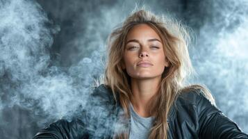 A woman is sitting in front of a smoke machine photo