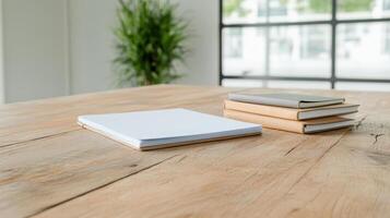clean workspace featuring blank sheets and stacked notebooks wooden table, creating serene photo
