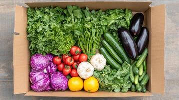 A box of fresh vegetables is shown in the photo