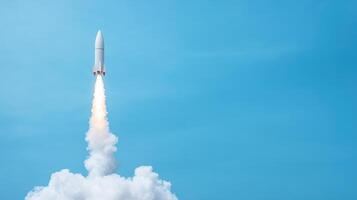 Rocket launch against clear blue sky, showcasing powerful ascent and dynamic motion photo