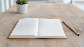 Open notebook and pencil on wooden table photo