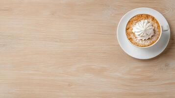 Creamy coffee topped with whipped cream on wooden table creates cozy atmosphere photo