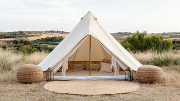 minimalist boho tent setup in serene landscape, surrounded by nature beauty photo