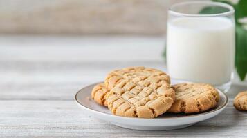 Delicious cookies on plate with glass of milk create cozy atmosphere photo