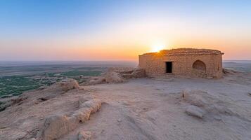 stunning sunset over ancient structure desert landscape, showcasing natural beauty and history photo