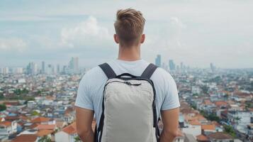traveler gazes at vibrant cityscape from rooftop, feeling inspired and adventurous photo