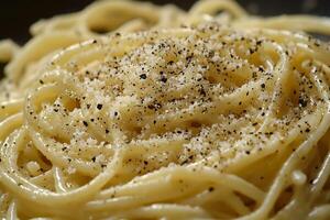 A close up of a plate of spaghetti with salt photo