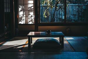 A table and a rug in front of a window photo