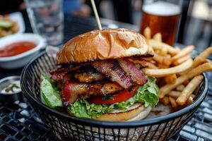 A close up of a burger and fries photo