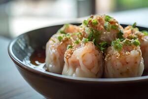 A bowl of food with shrimp and sauce photo