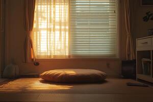 A large round cushion sitting on a floor in front of a window photo