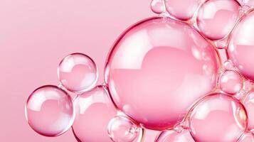 Red bubbles float in transparent liquid with soft blush lighting, creating an abstract texture that evokes beauty and scientific curiosity photo