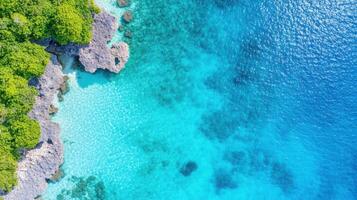 Top-down view showcasing a tropical island paradise with turquoise lagoon and coral reef in a vibrant setting photo