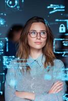 Businesswoman analyzing holographic computer data in augmented reality environment photo