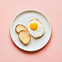 breakfast with egg and toast. fried egg on toast on a plate. Top view. flat lay, selective focus. photo