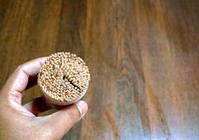 some toothpicks placed on a table photo
