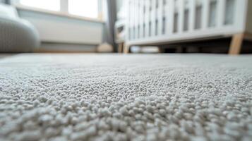 Close-up of soft carpet in sunlit nursery interior setting photo