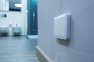 Smart home sensor in modern bathroom environment photo