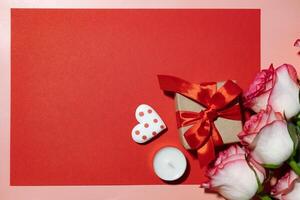 A collection of gift items and roses for a special event. photo