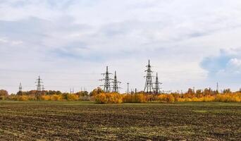 A shot of high voltage electric transmission tower. photo