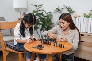 Family Games and Togetherness. A touching moment during a domino game highlights familial love and interaction. photo