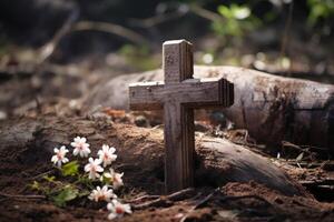 Wooden Cross Standing Amidst Nature With Small White Flowers. photo