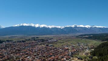 Razlog Valley Flourishing Under Majestic Pirin Mountain Range in Spring photo