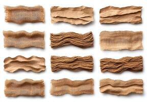 A collection of textured, crumpled brown paper strips showcasing various patterns, arranged on a white isolated background. photo