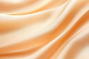 A close-up view of smooth, flowing satin fabric in a delicate peach color, showcasing its luxurious texture and sheen, perfect for fashion, interior design, and creative projects. photo