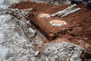 A sizable pile of dirt and rocks is currently sitting on the ground, forming an accumulation that can be observed in various locations around us, showcasing natural geological phenomena photo