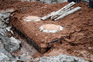 Dirt on rocky surfaces creates a geological phenomenon that connects various building materials and construction methods, showcasing the interplay between nature and human activity photo
