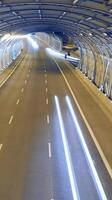 Illuminated Tunnel with Light Trails and Modern Architecture Design video
