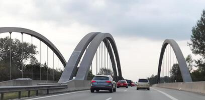 View of a highway passing over a bridge, creating a dynamic line. For concepts of infrastructure photo