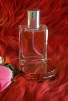 luxury Perfume bottles at display on a red background with copy space. closeup of photo. Selective focus. q photo