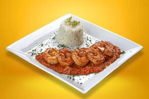 Large shrimp with tomato sauce. photo