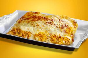 Roasted chicken lasagna with mozzarella photo