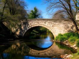 A stone bridge over a river photo