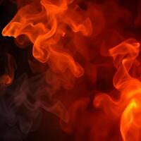 Fire and smoke on black background photo