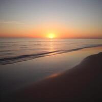A sunset over the ocean with the sun setting behind it photo