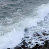 A person on a surfboard riding a wave photo
