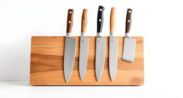 A knife block with five knives on it photo