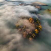 An aerial view of a foggy landscape photo