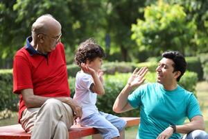 Father And Son Giving High Five photo