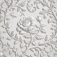 A white wall with a rose and leaves photo
