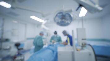 Blurred background of surgical operation of a surgeons in a medical operating room. video