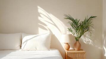 A white bed with a plant on it photo