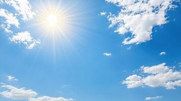 The sun shines brightly over a blue sky photo