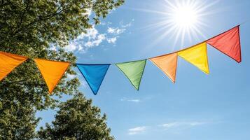 A rainbow flag with a sun in the sky photo
