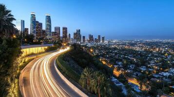 The city skyline is seen from above at dusk photo