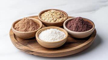 Various types of protein powder in wooden bowls photo
